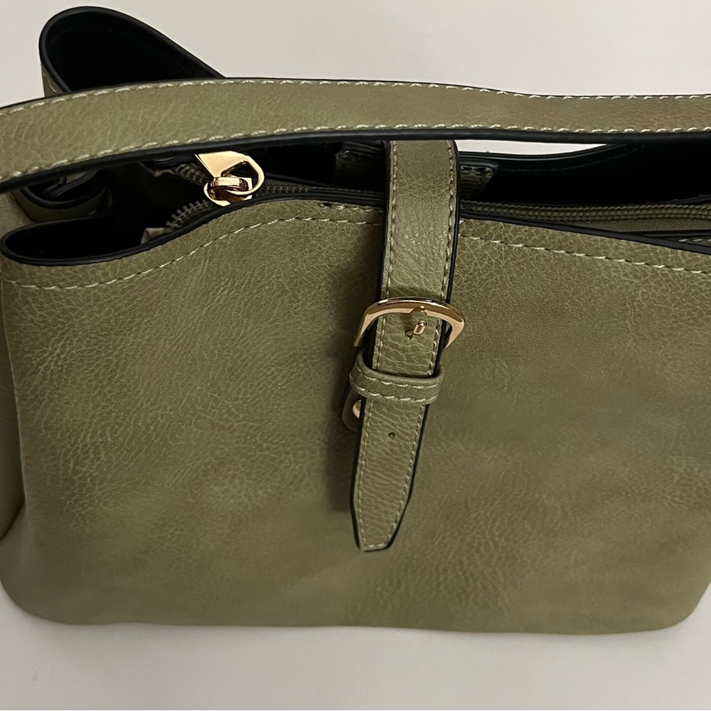 Bucket satchel bag in moss green color with detachable guitar straps medium size